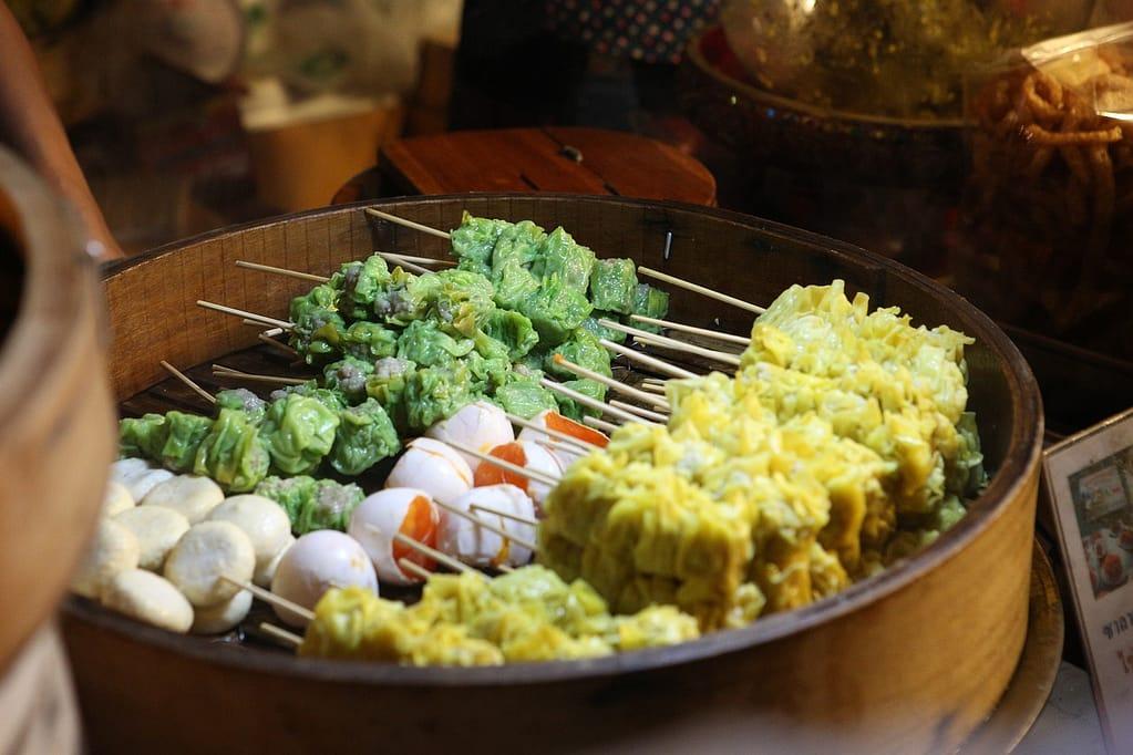 Street food skewers at an Asian market